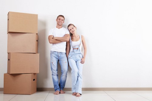 Moving team planning a home move in Aldboroughhatch street setting
