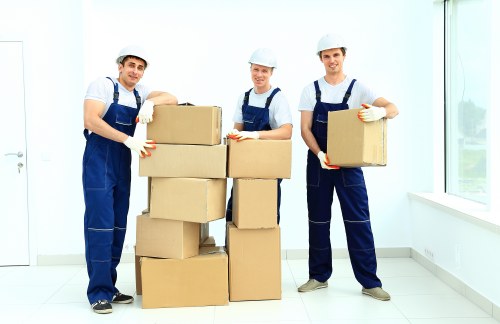 Boxes and furniture loaded into a van for transport