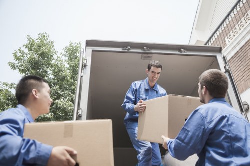 Packed boxes and furniture ready for house removals