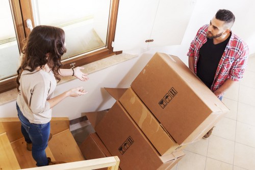Careful loading of household items for a move in Aldboroughhatch