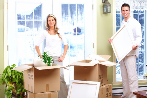 Removal van assisting with a flat move and household items