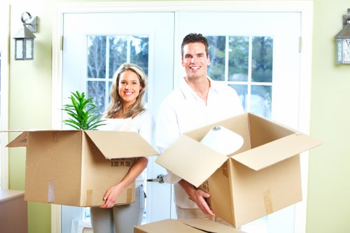 Business relocation items being prepared for moving van transport